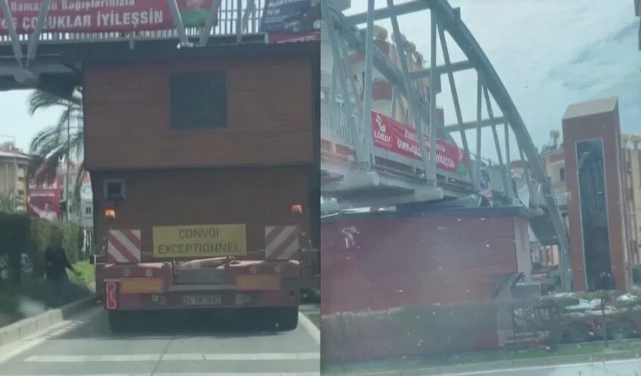 Konteyner ev taşıyan tır üst geçit altında sıkıştı