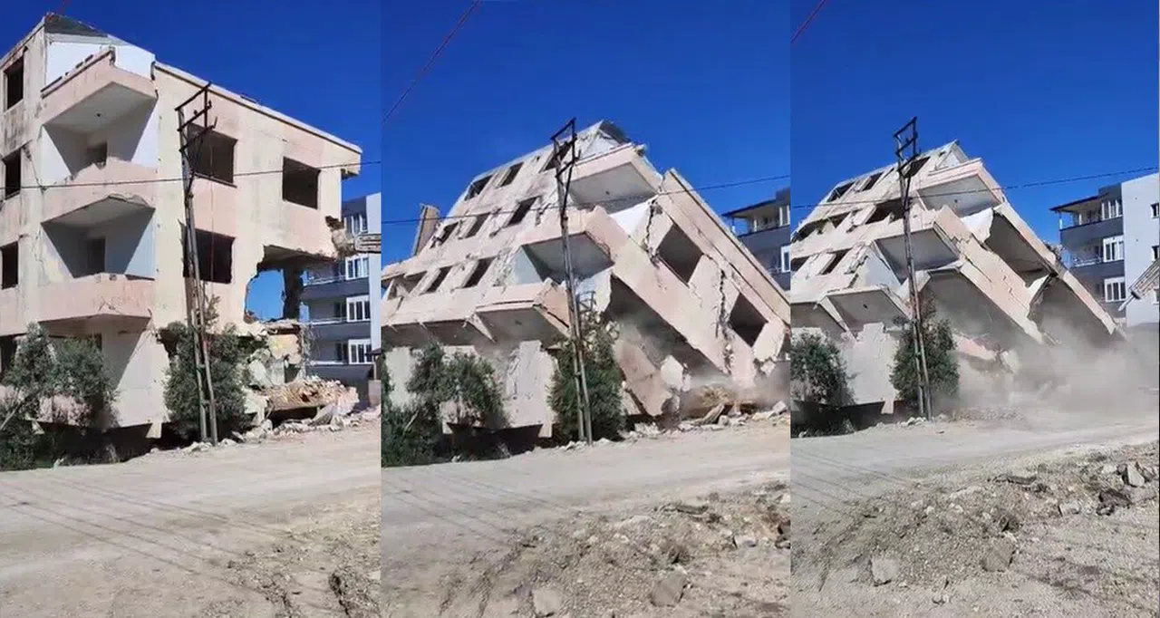 4 katlı bina iş makinesinin darbesiyle yerle bir oldu