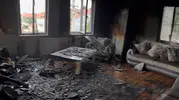 Yangında eşyaları kül olan aileye Sevgi Eli sahip çıktı