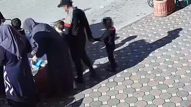 Dikkat çekmemek için çocuğuyla hırsızlığa çıktı