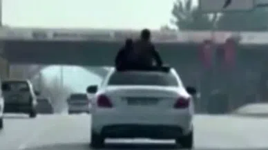 Üstü açık otomobilde tehlikeli yolculuk