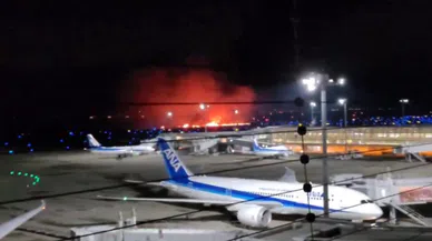 Japonya’da yolcu uçağı yandı