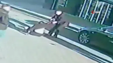 Bisikletten düşen çocuğu tişörtünden sürükledi